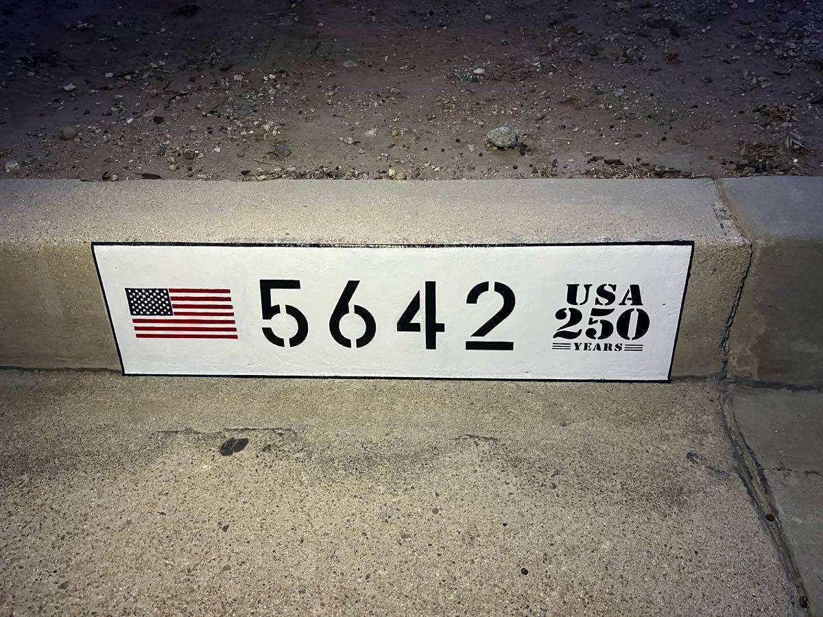 Custom curb address 5642 with American flag and USA 250 Years stencil
