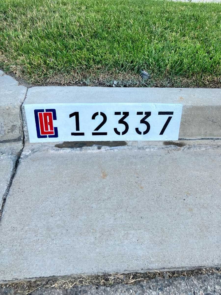 Custom 12337 curb address with a hand-painted LA Clippers logo